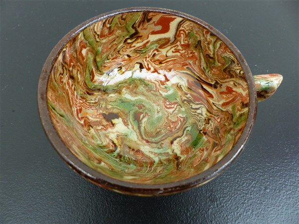 Apt earthenware coffee cup