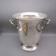 Antique silver-plated champagne bucket in the Médicis style.