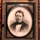 Black and gilded ebonite frame, wood and plaster 19th century