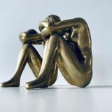 Couple carved in gilded bronze
