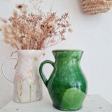 Antique green pitcher in painted terracotta