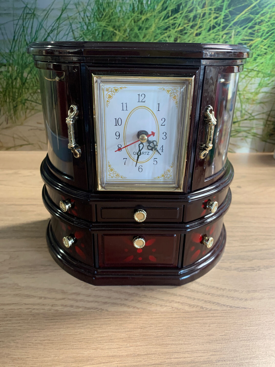 Jewelry cabinet with clock