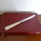 12 Art Deco knives 1930 bone or bakelite sleeves in case
