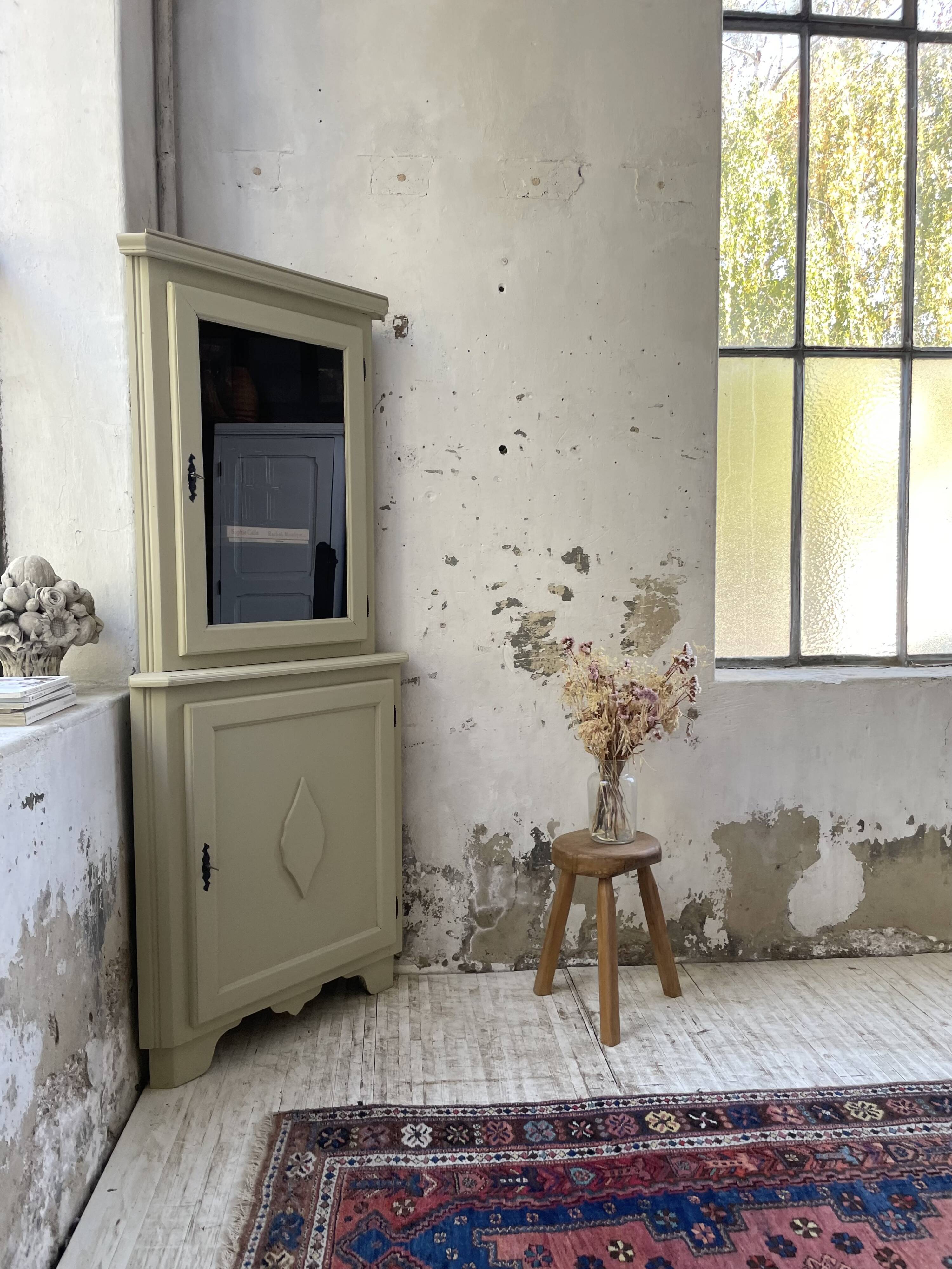Corner display cabinet from the 1950s