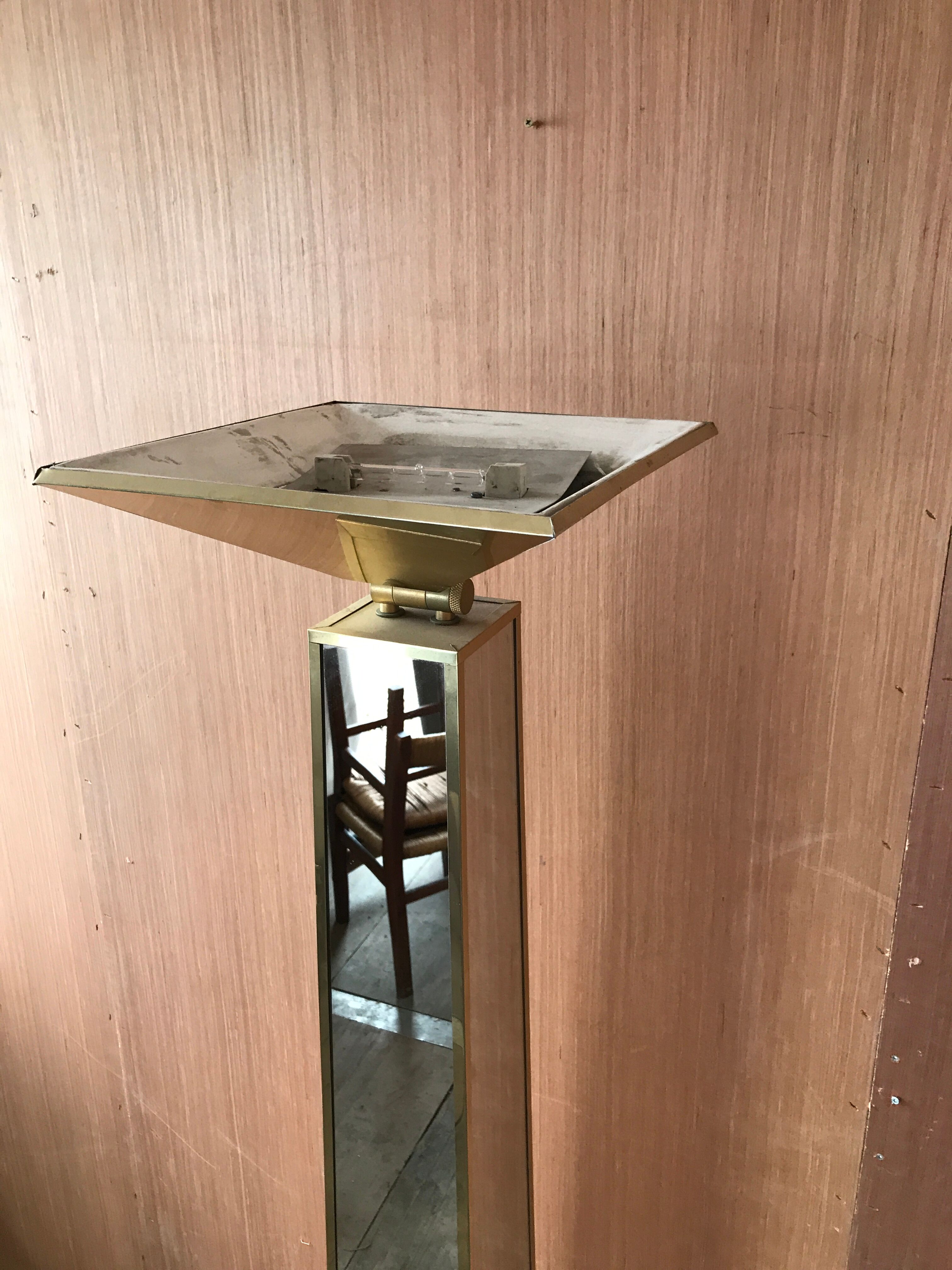 Mirror and gold metal lamppost