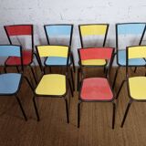 8 canteen chairs, yellow, blue, and red Formica with metal tubing from the 1950s-60s.