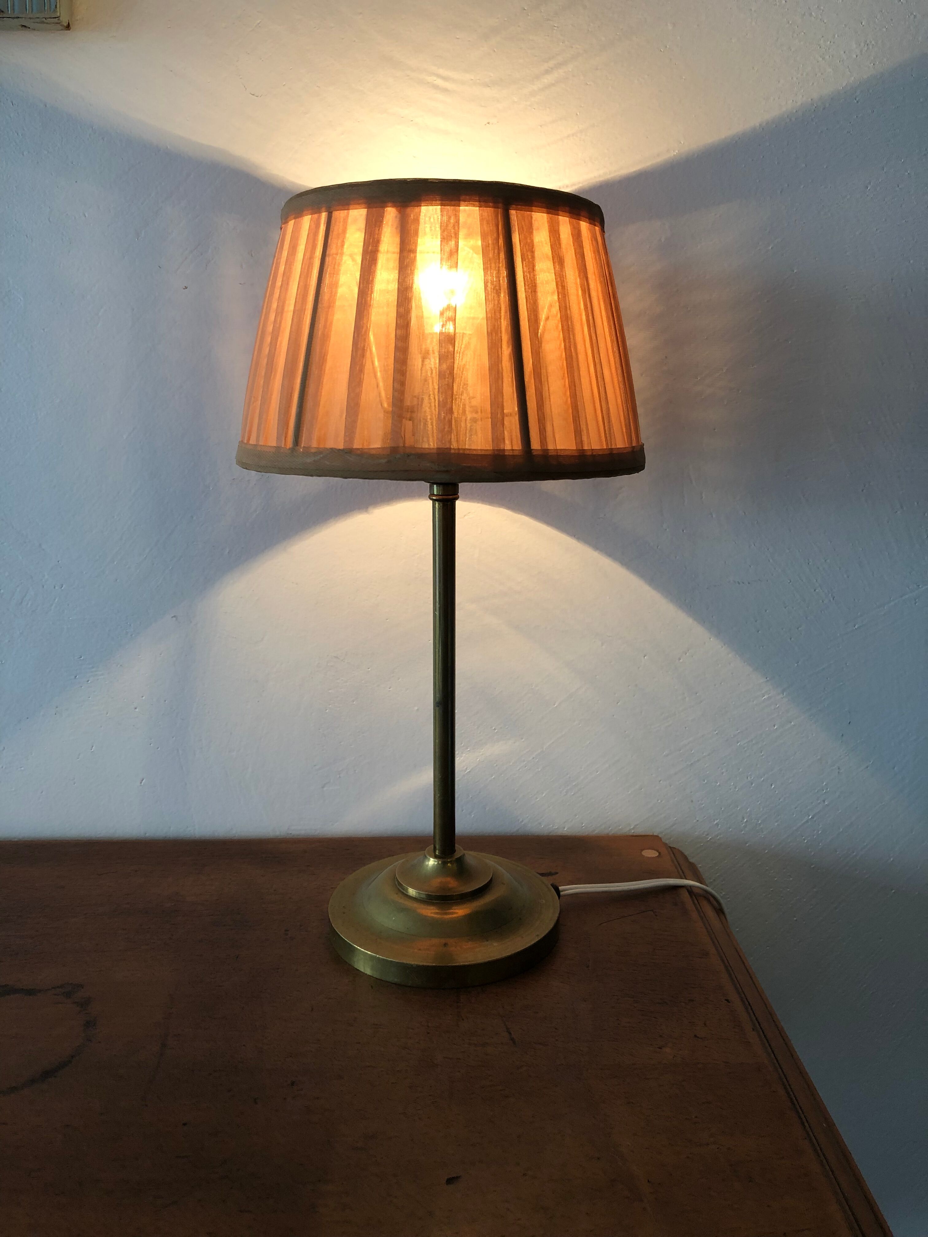 Ancient brass lamp, folded day offal