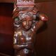 Hand-carved library circa 1900 in hardwood with Hermes statues.