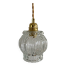 Lamp with vintage globe in transparent molded glass