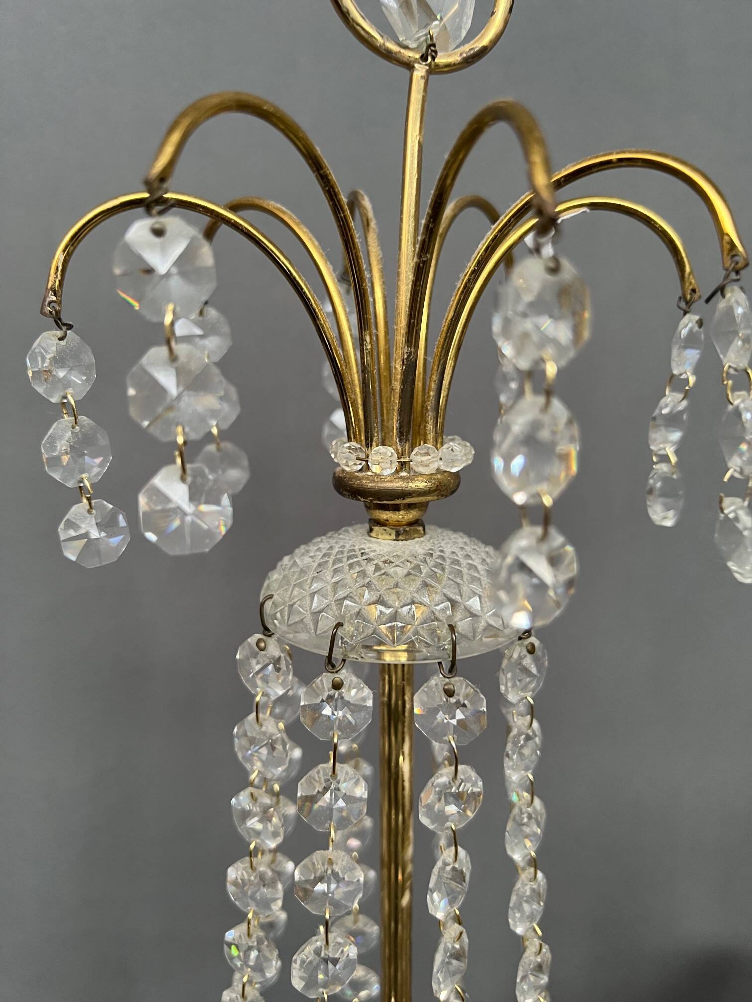 Girandole. Brass, crystal, bronze.