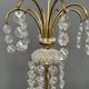 Girandole. Brass, crystal, bronze.