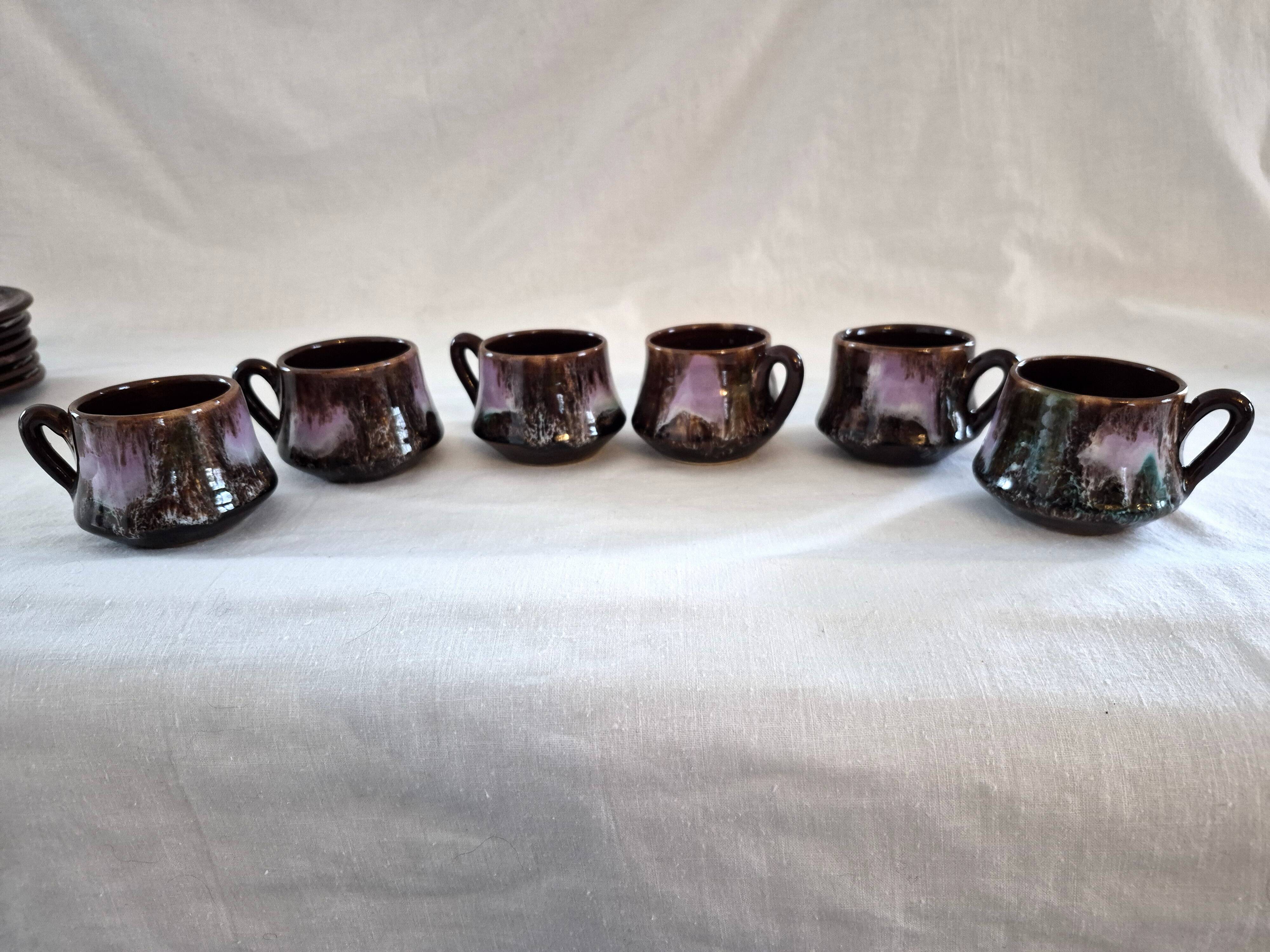Six cups and saucers Vallauris glazed ceramic in brown and old pink.