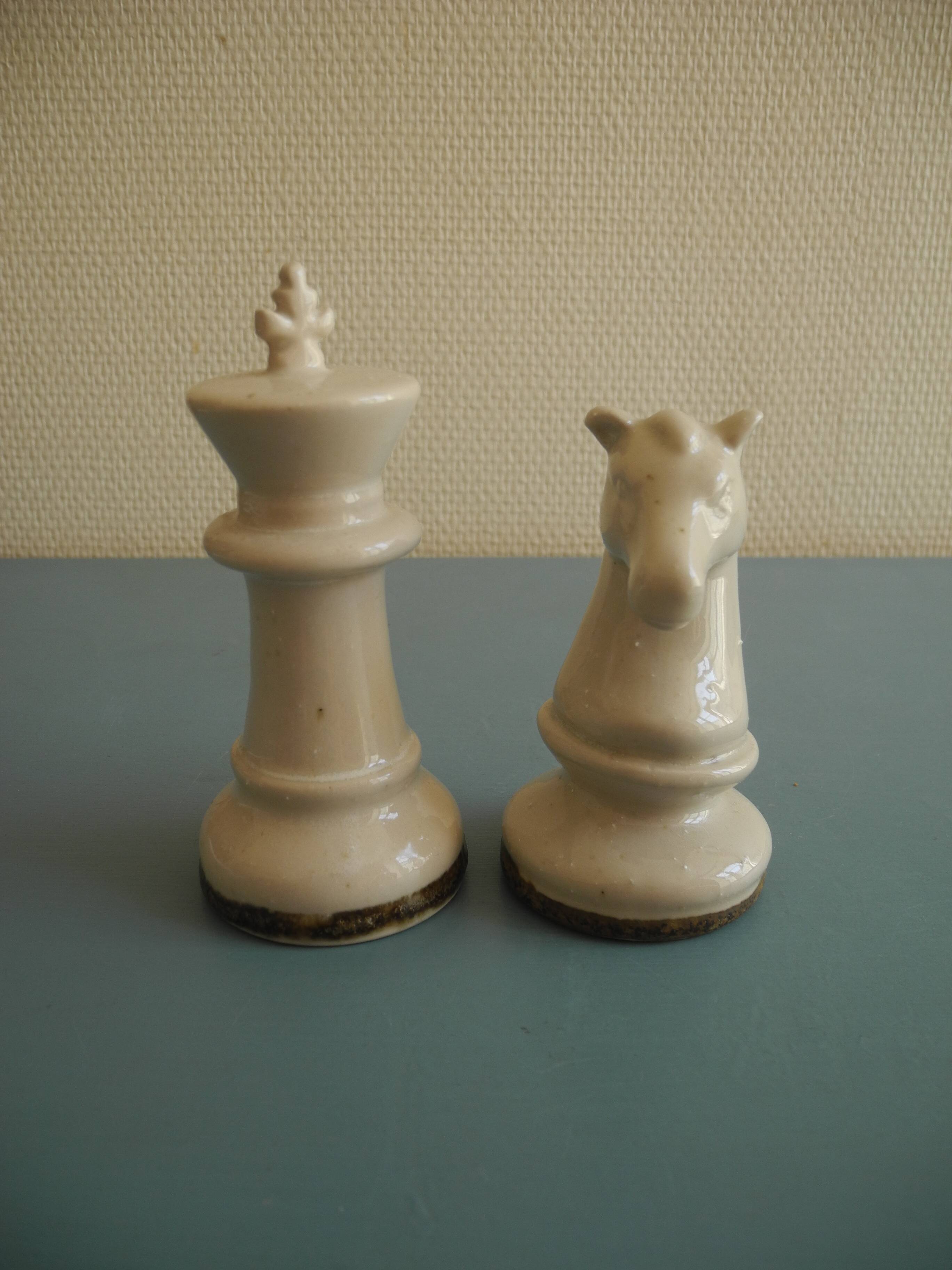 two ceramic chess pieces decorative