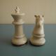 two ceramic chess pieces decorative