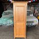 Wardrobe / Solid wood storage unit with one door.