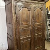 Louis XV carved wooden wardrobe from the 18th century