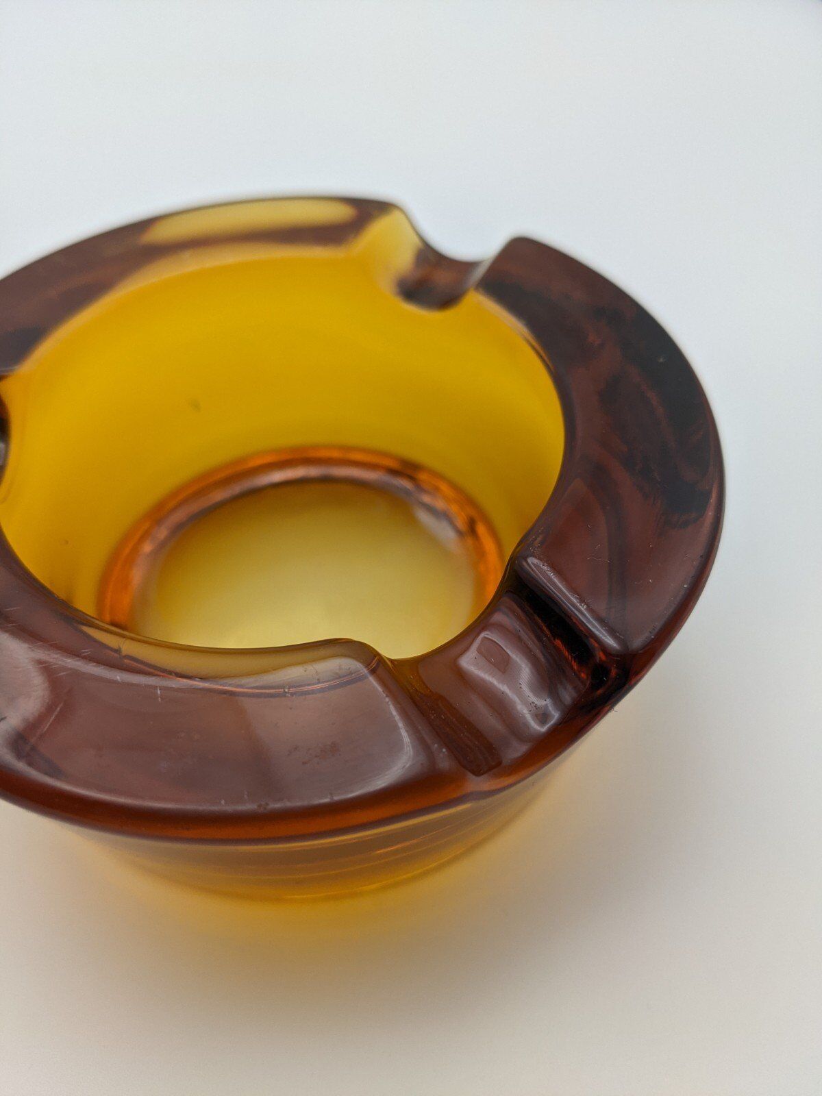 Amber glass ashtray 70s
