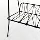 Side table with vintage metal and wood magazine holder
