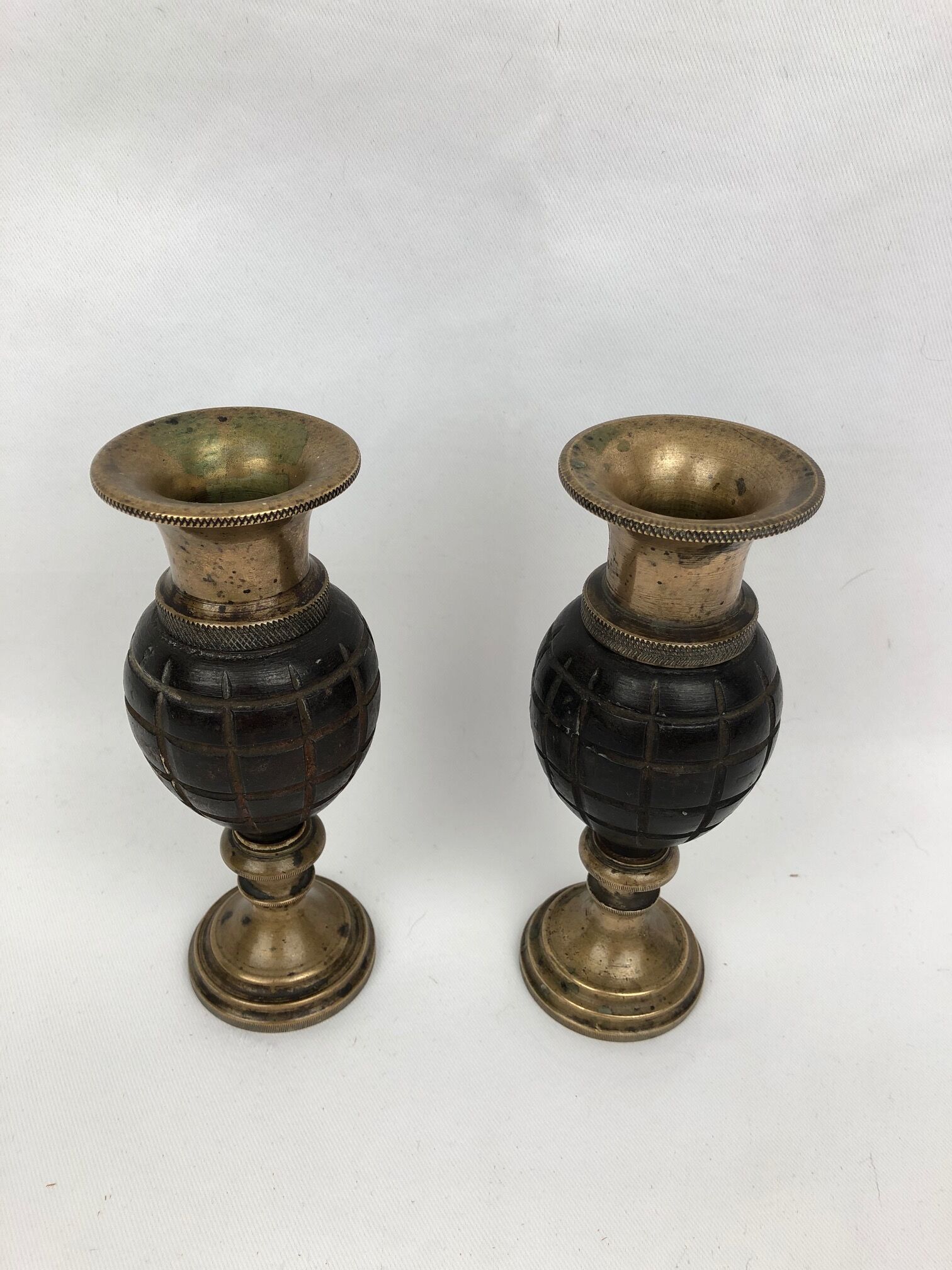 Pair of "Grenade" candlesticks, bronze, 20th