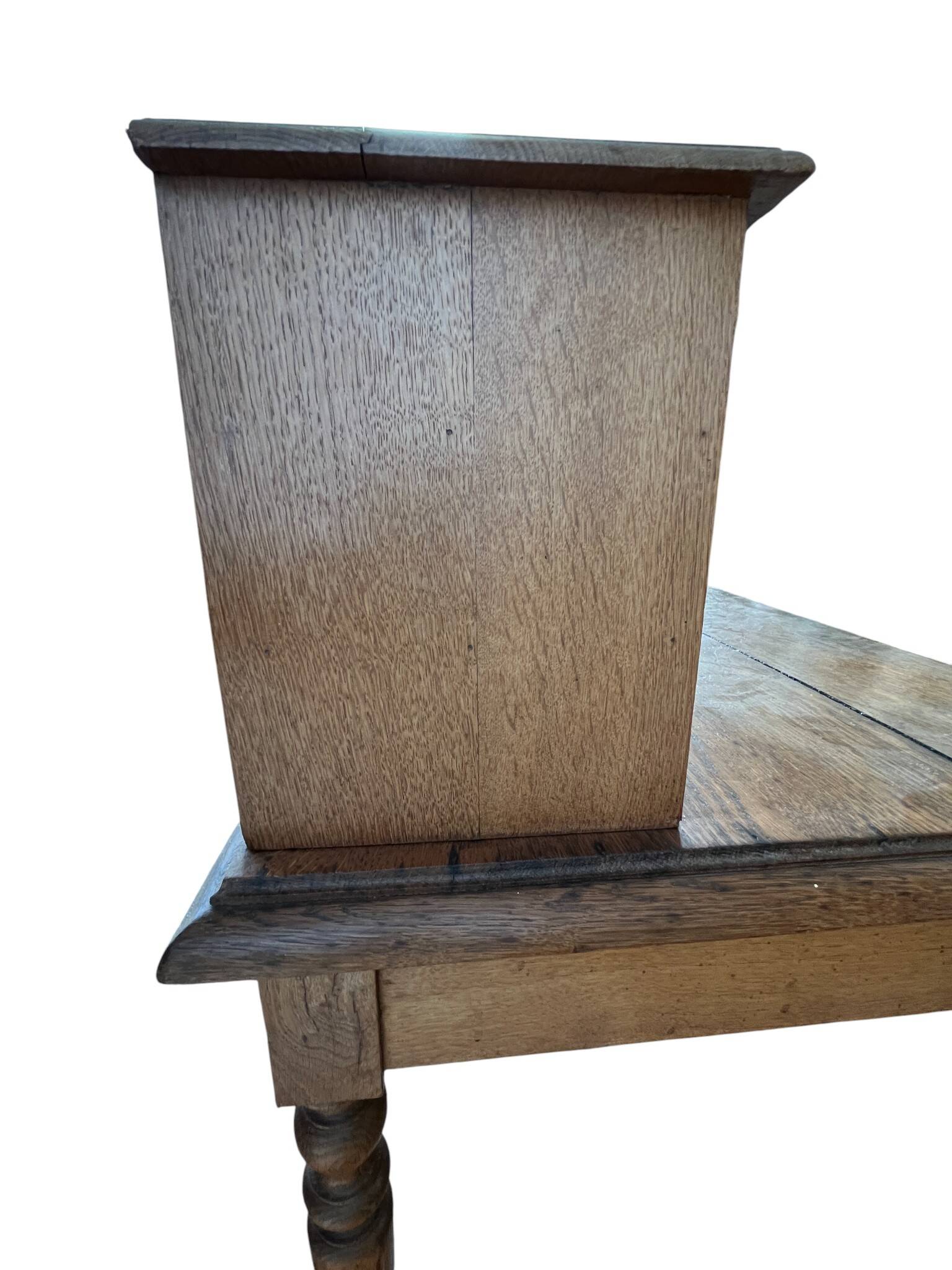 Antique oak tiered desk with stretcher, early 20th century.