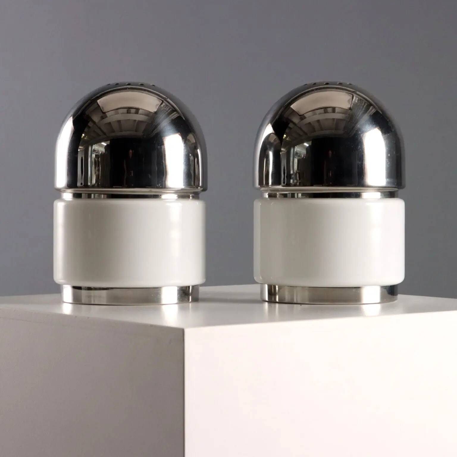 Pair of vintage Reggiani "Salt and Pepper" metal table lamps, 1960s design.