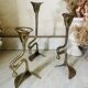 Art Nouveau style brass candlestick trio