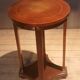 Varnished round gueridon