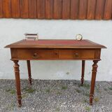 Old wooden desk, red felt top