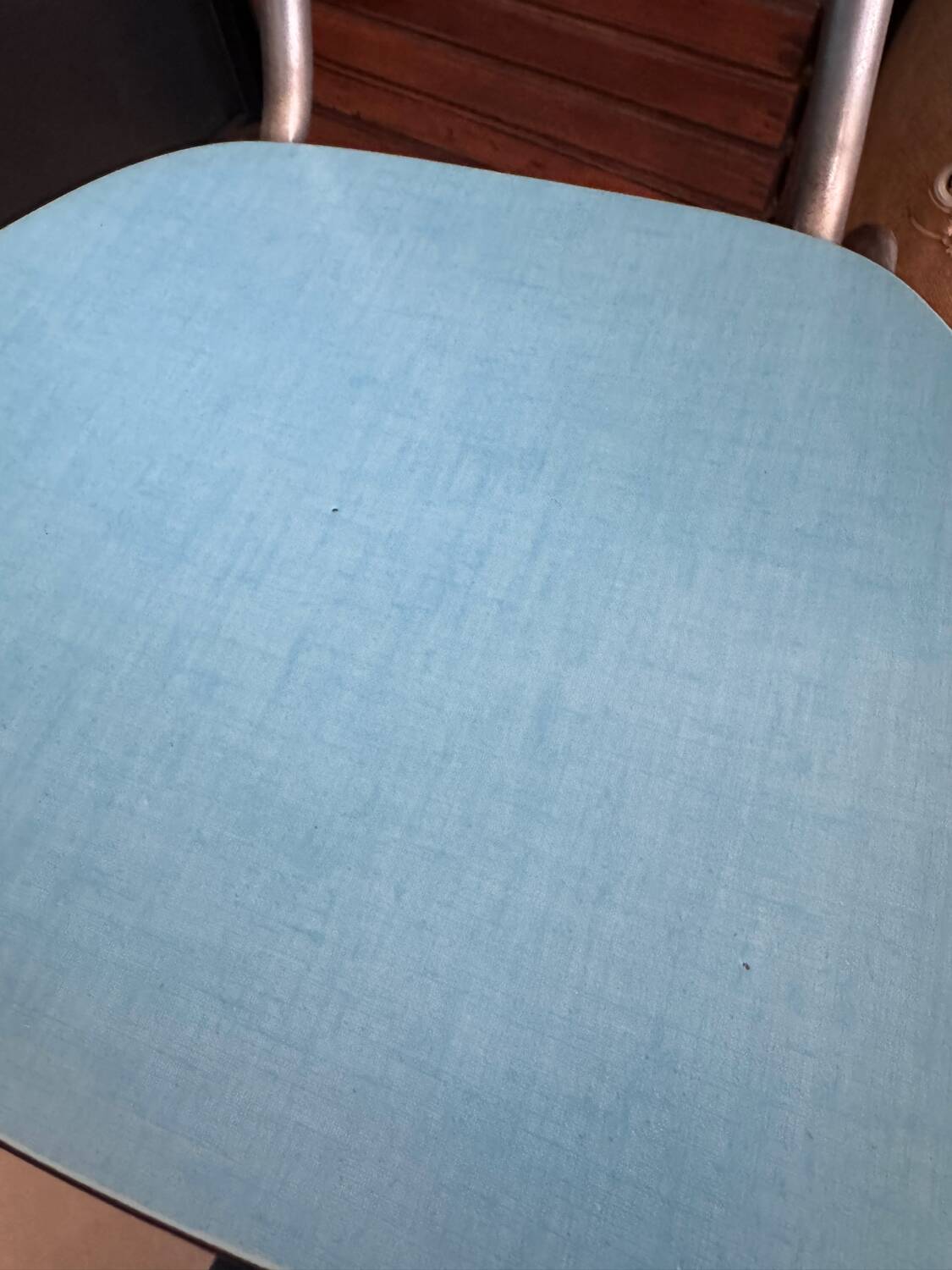 Pair of vintage blue Formica chairs