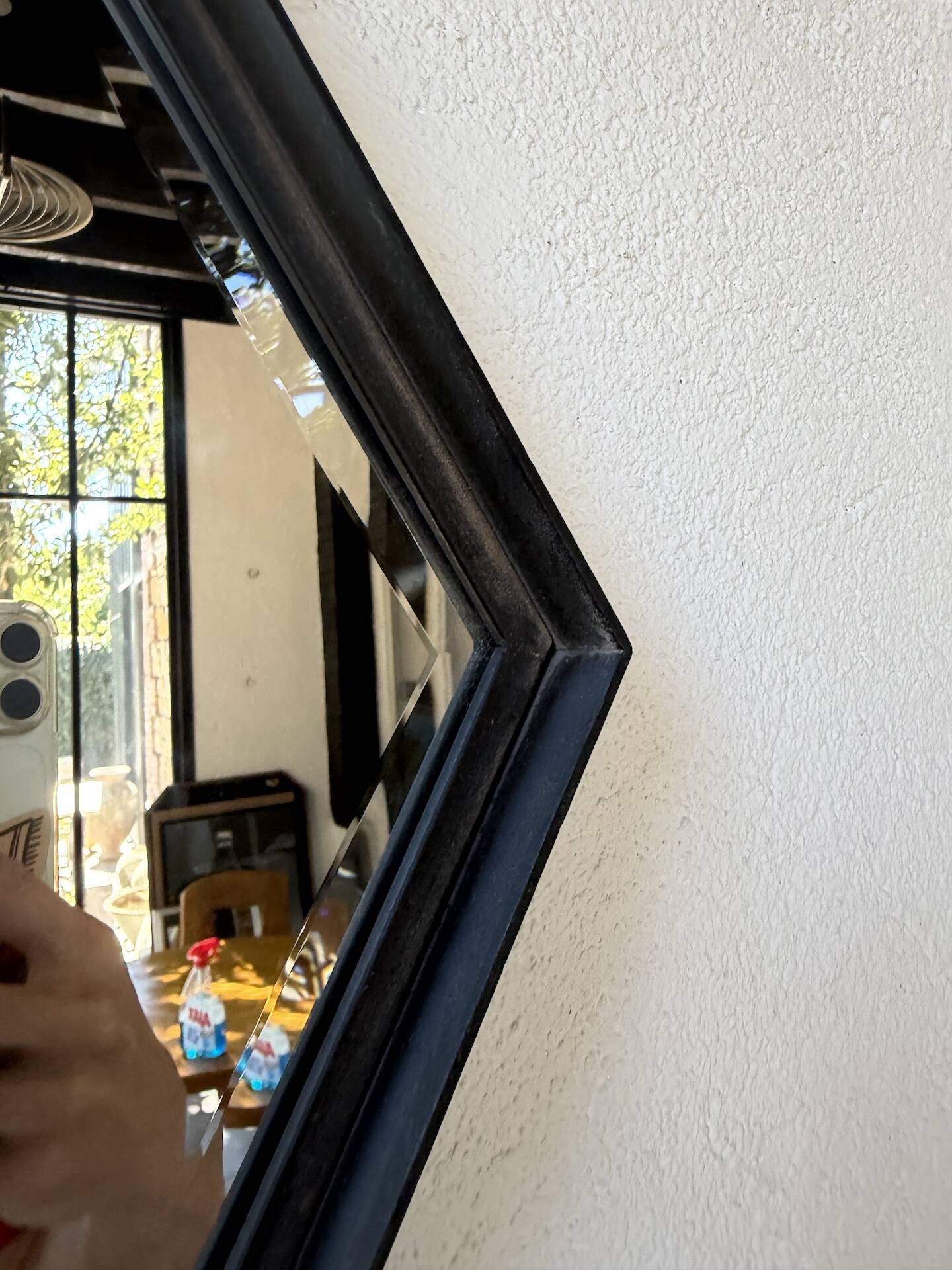 Miroir brutaliste losange en fer