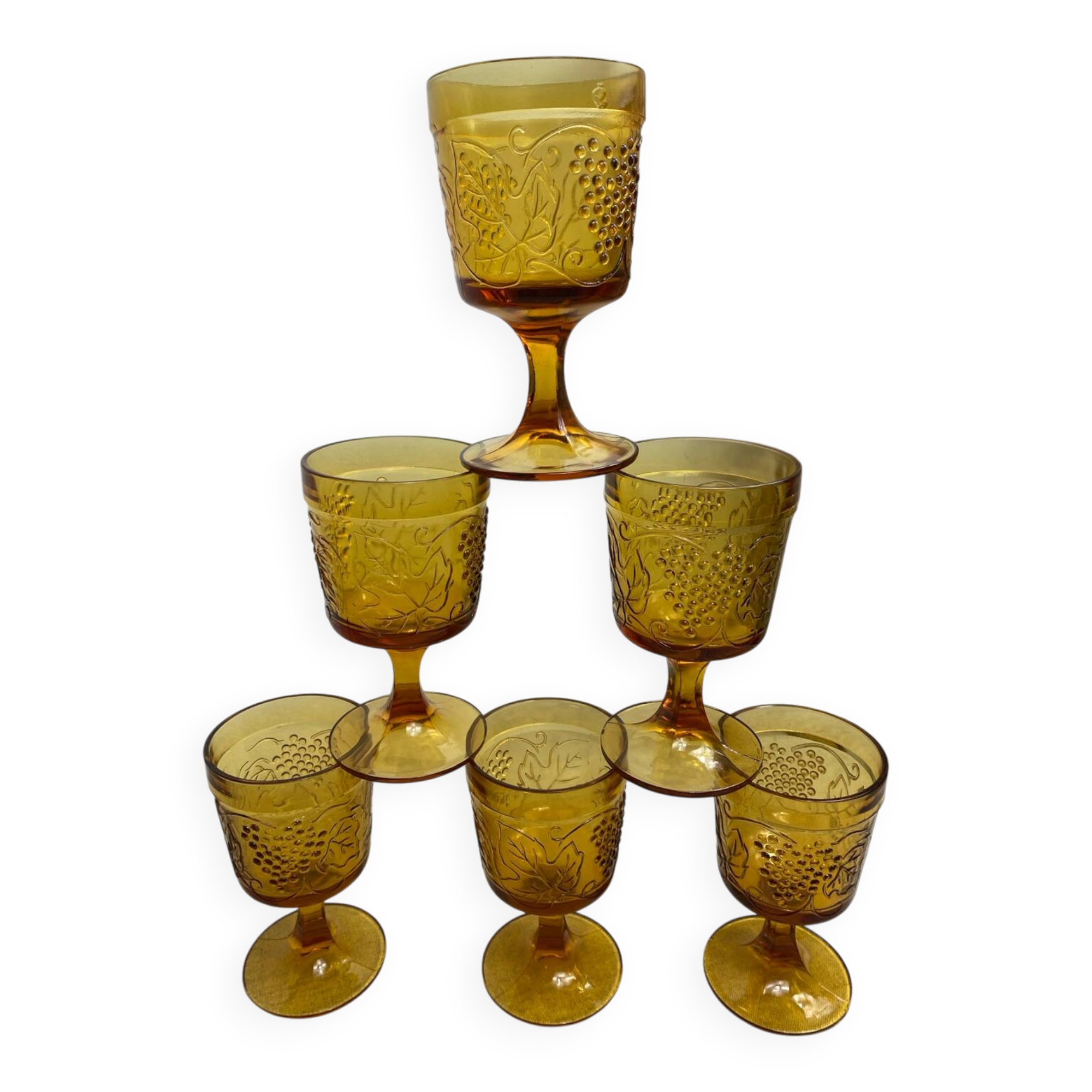 Six stemmed glasses in amber-colored molded glass