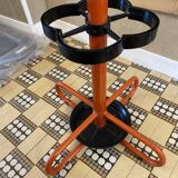 Designer red metal coat rack
