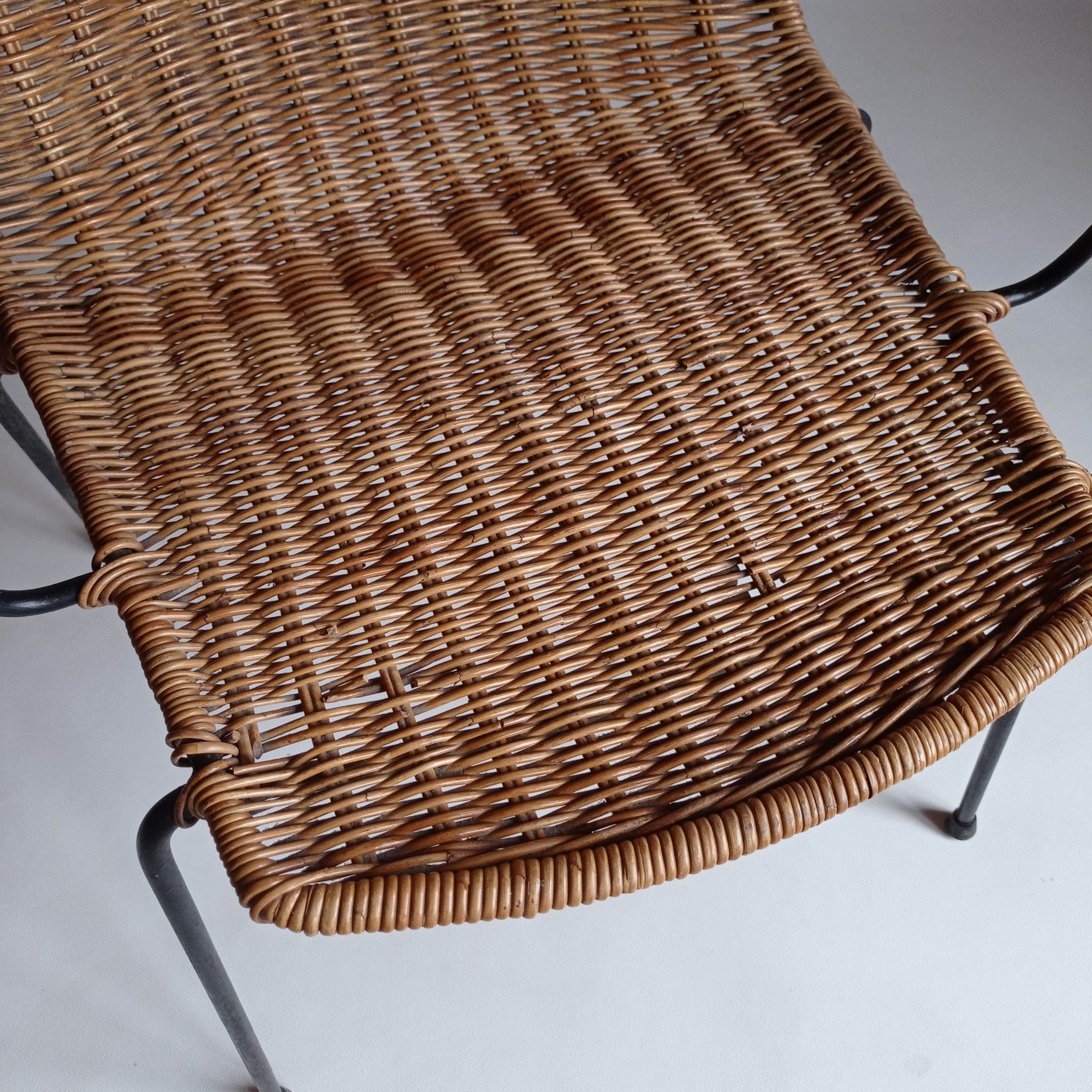 Wicker chair with Campo and Graffi armrests from the 60s.