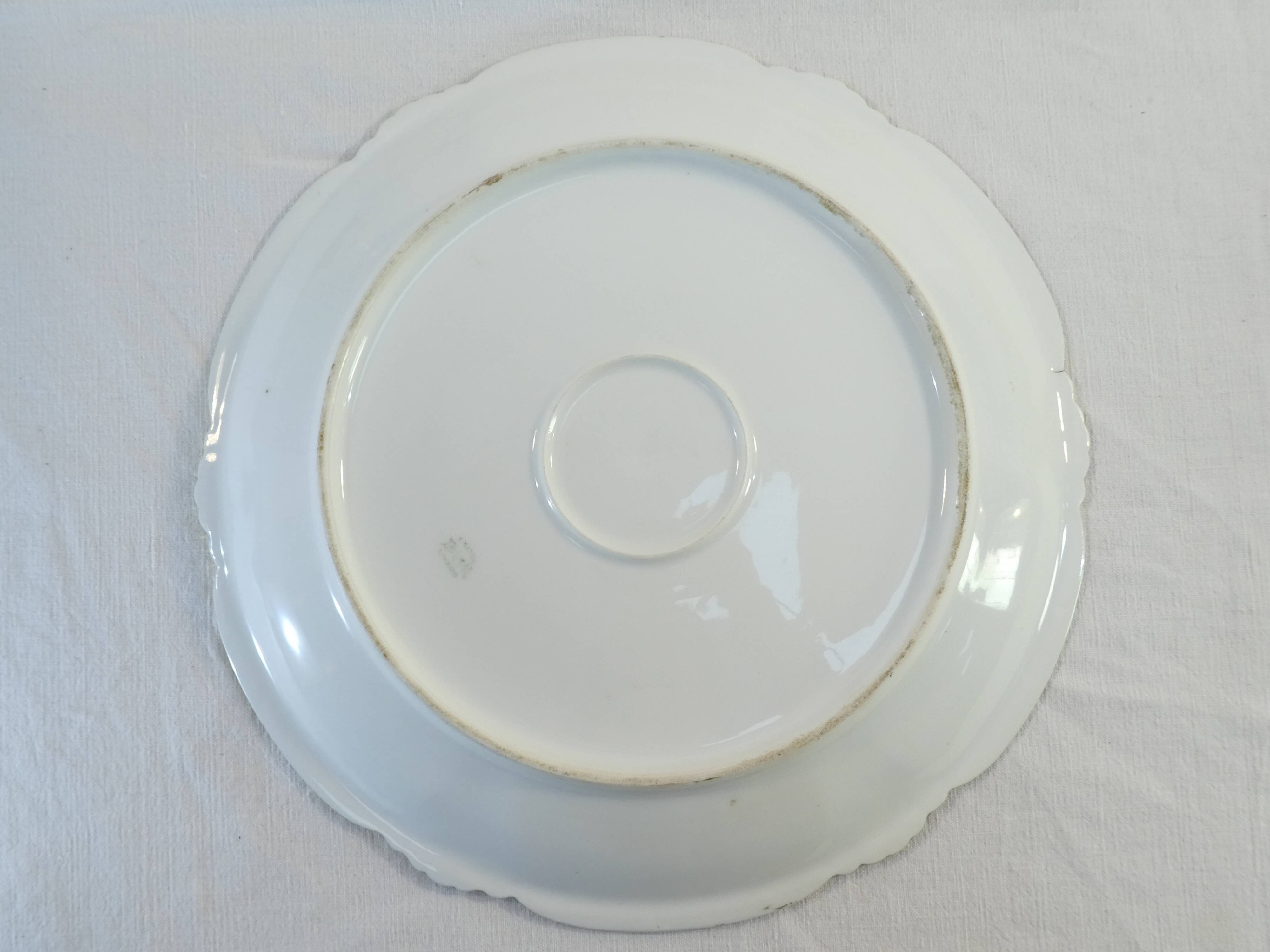 Pair of limoges porcelain plate ''Mandavy de mavaleix'' rose decoration