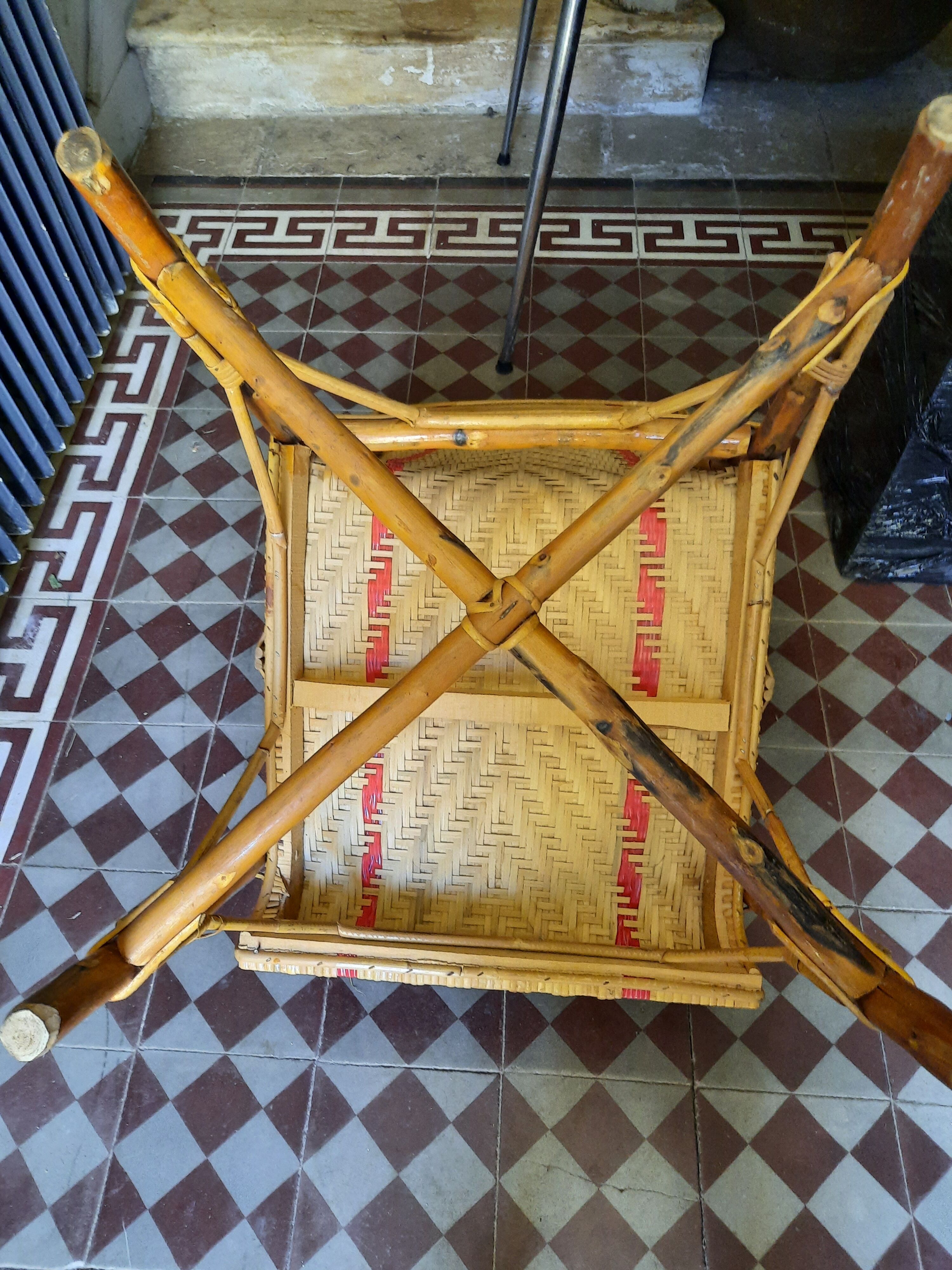 Braided rattan armchair