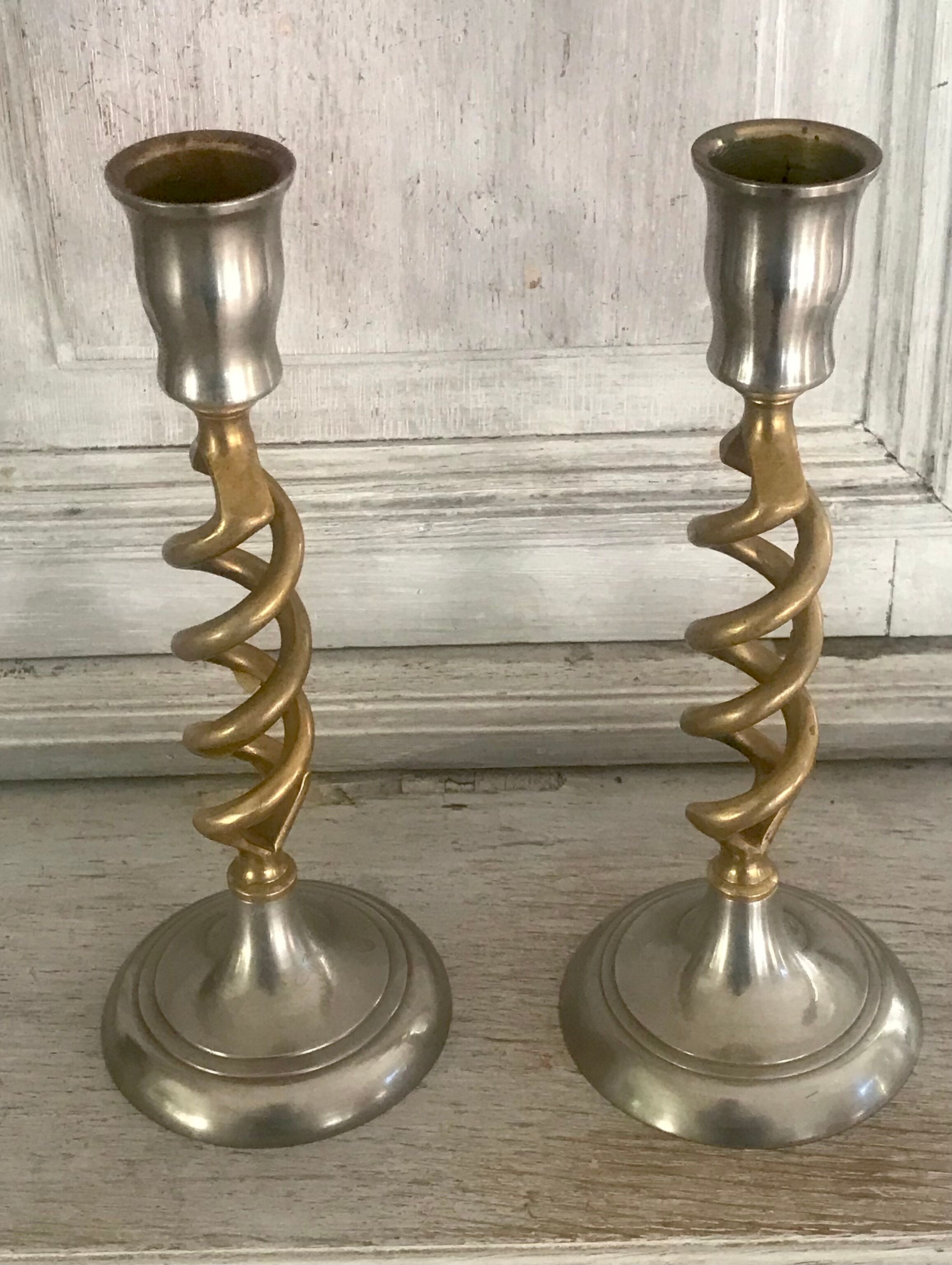 Pair of twisted brass candle holders