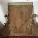 Old golden stucco mirror