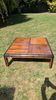 Vintage square coffee table in solid wood with rounded blackened corners –