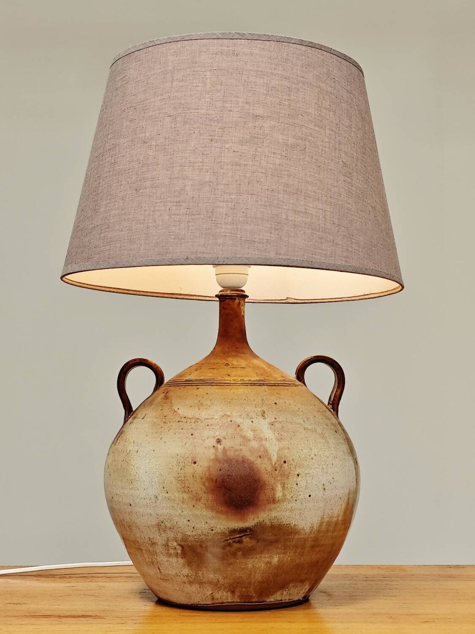 Modernist ceramic sandstone lamp with two handles from the 1950s