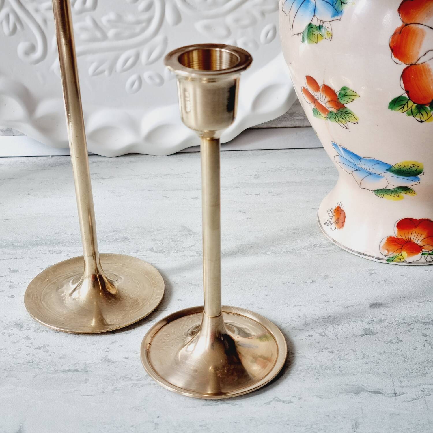Duo of brass candlesticks