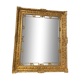 Wooden mirror with gilded stucco