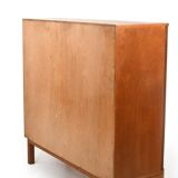 Armoire danoise à porte tambour en teck des années 1950