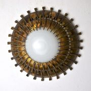 Midcentury brutalist sun wall lamp, metal and gold leaf, Italy