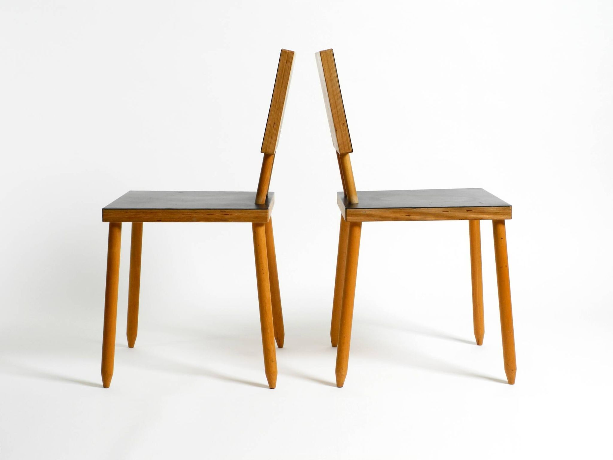 Two rare demountable plywood chairs by Axel Kufus model Stöcke for Atoll