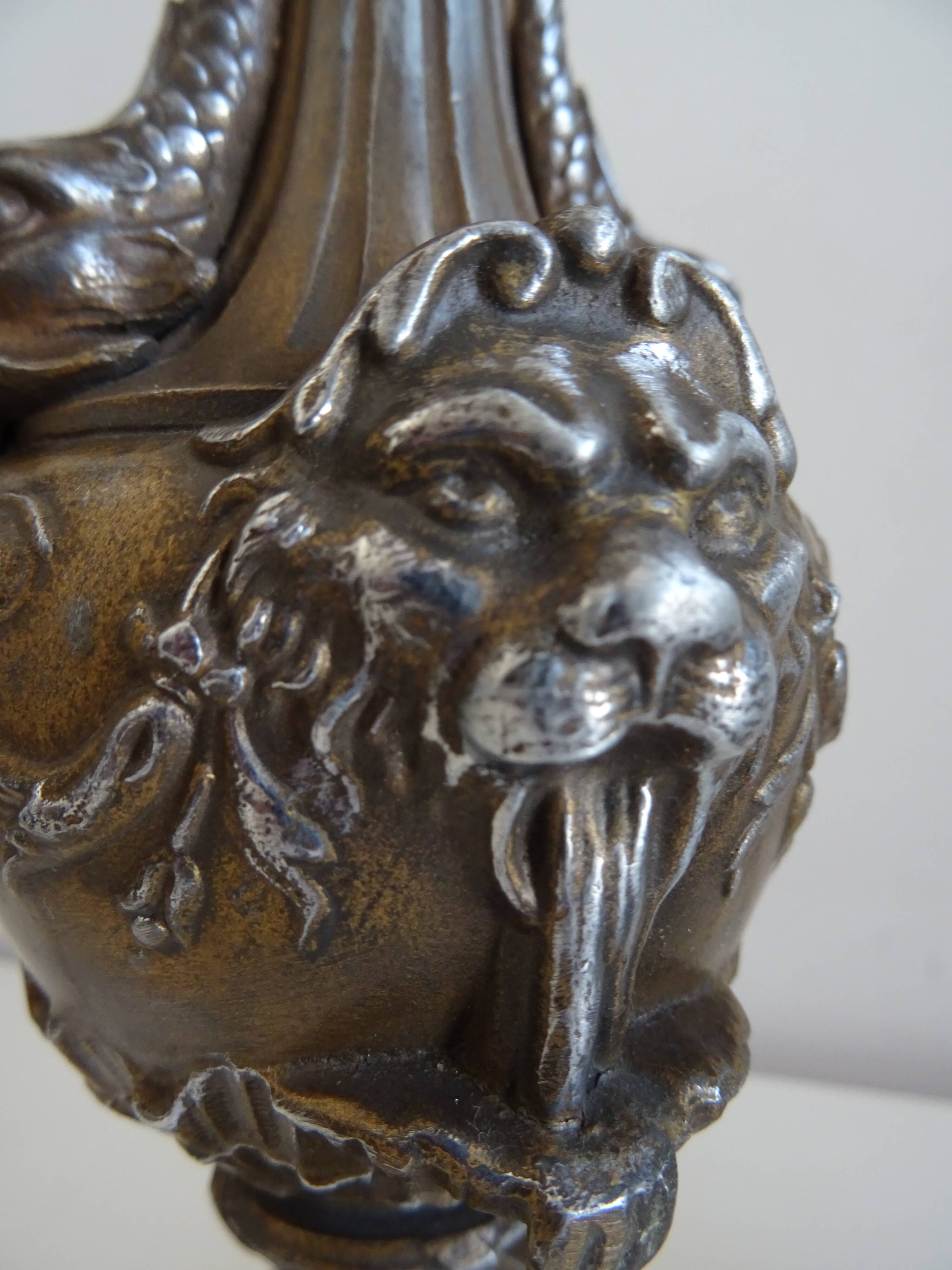 Pair of Louis XVI style lion and cherub decoration lamps