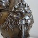 Pair of Louis XVI style lion and cherub decoration lamps
