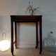 Vintage wooden wheeled side table/console.
