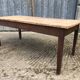 Rustic antique farmhouse table in solid cherry wood.