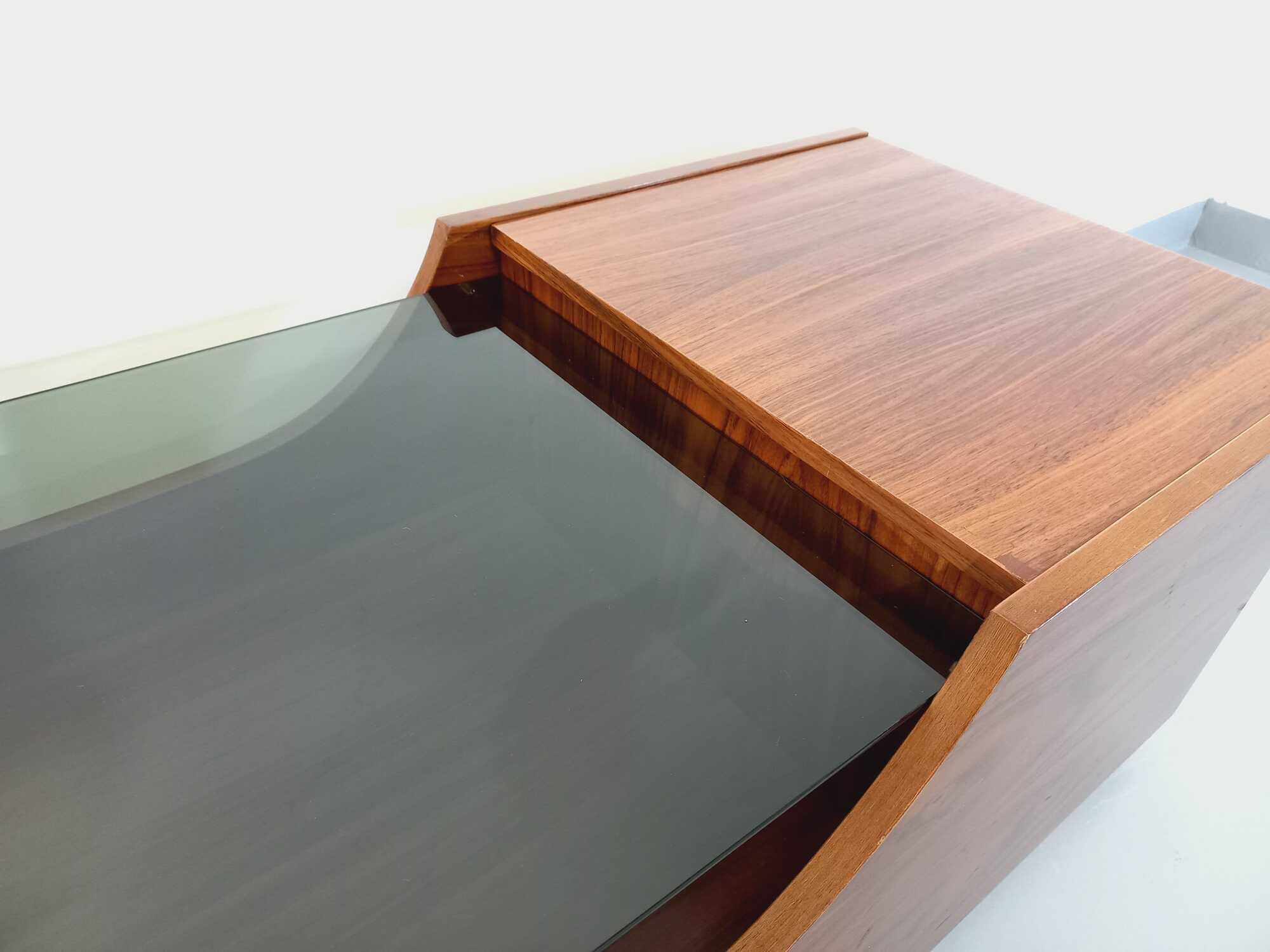Vintage bar coffee table on rosewood wheels and smoked glass from the 60s