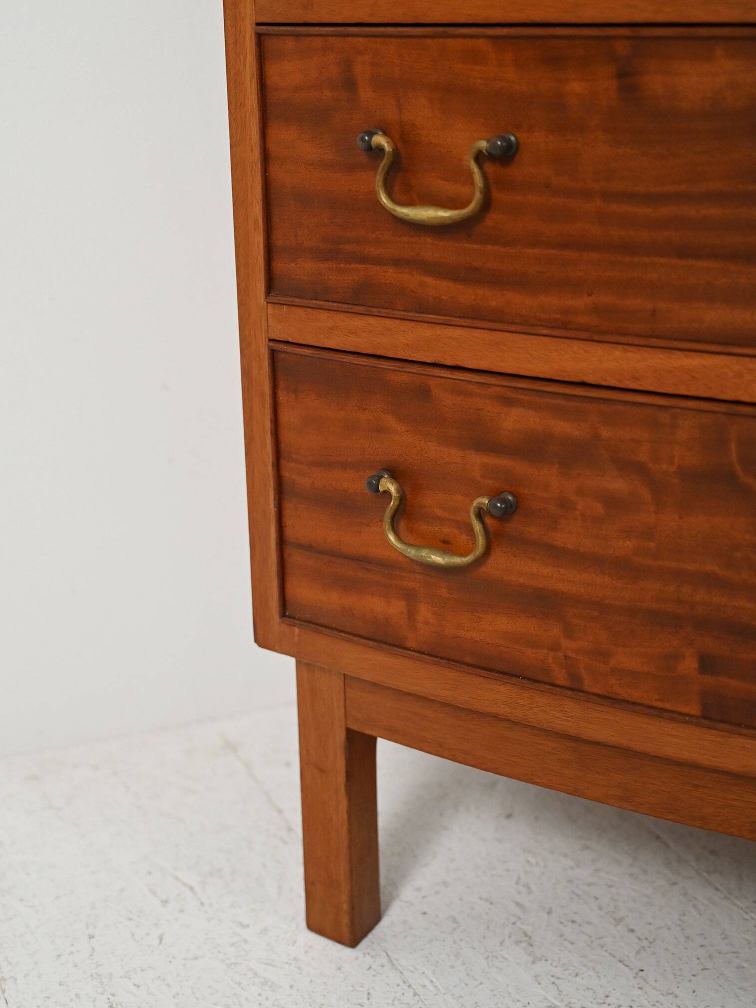 Scandinavian mahogany tallboy with brass handles